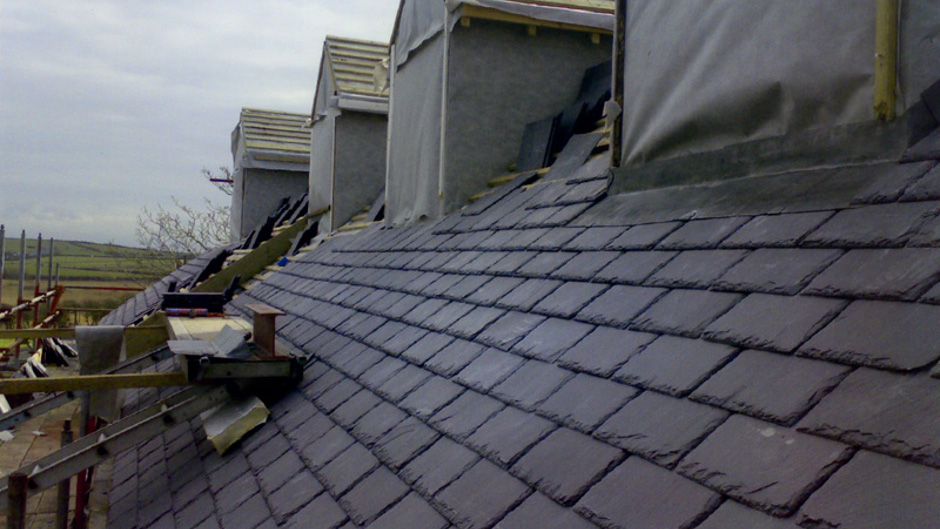 Roofing work - slates.